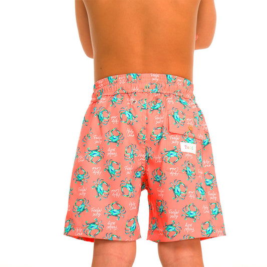 orange swim shorts with crab pattern on a white background