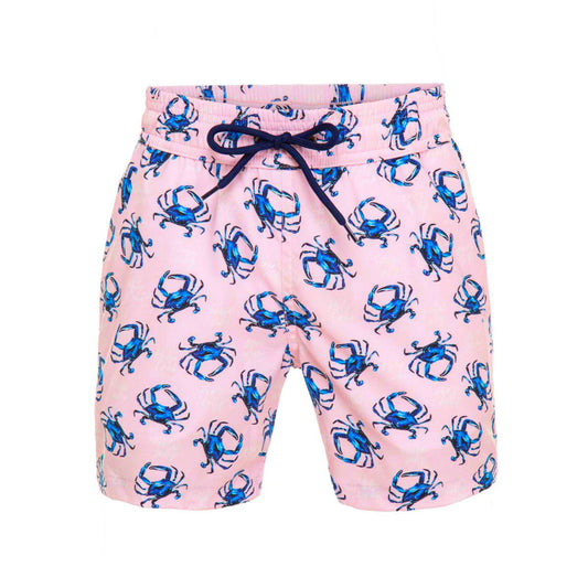 Pink swim shorts with blue crab pattern on a white background